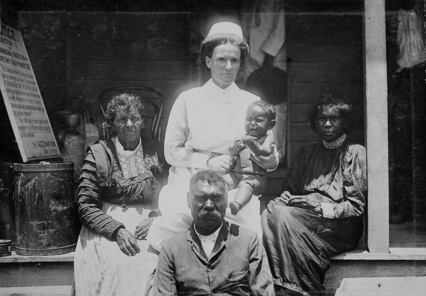 Nurse with three generations at Barambah Aboriginal Settlement, 1911