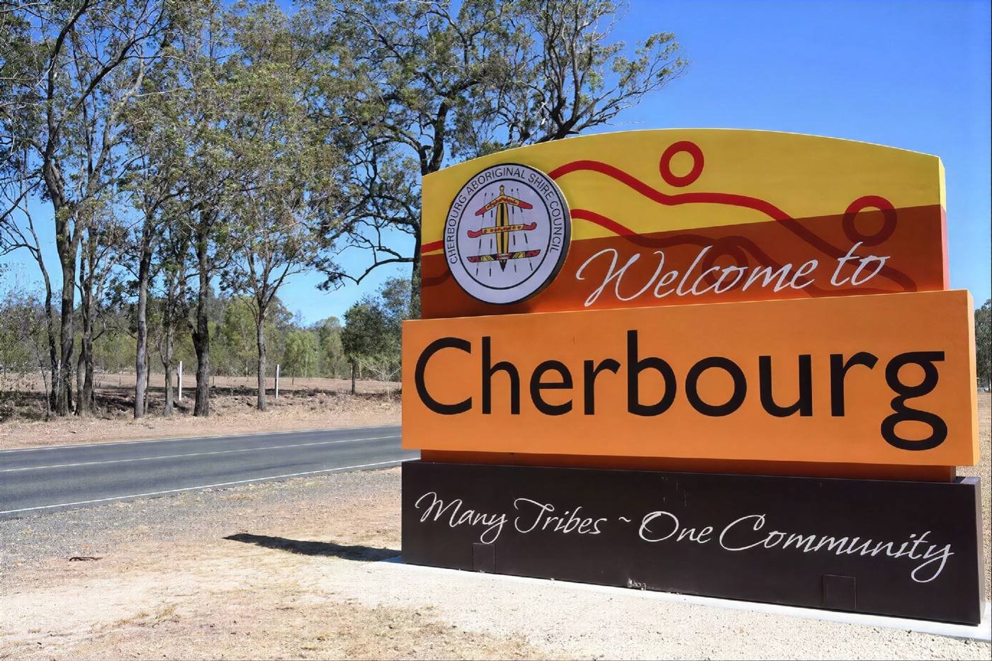 The Welcome to Cherbourg sign at the roadside